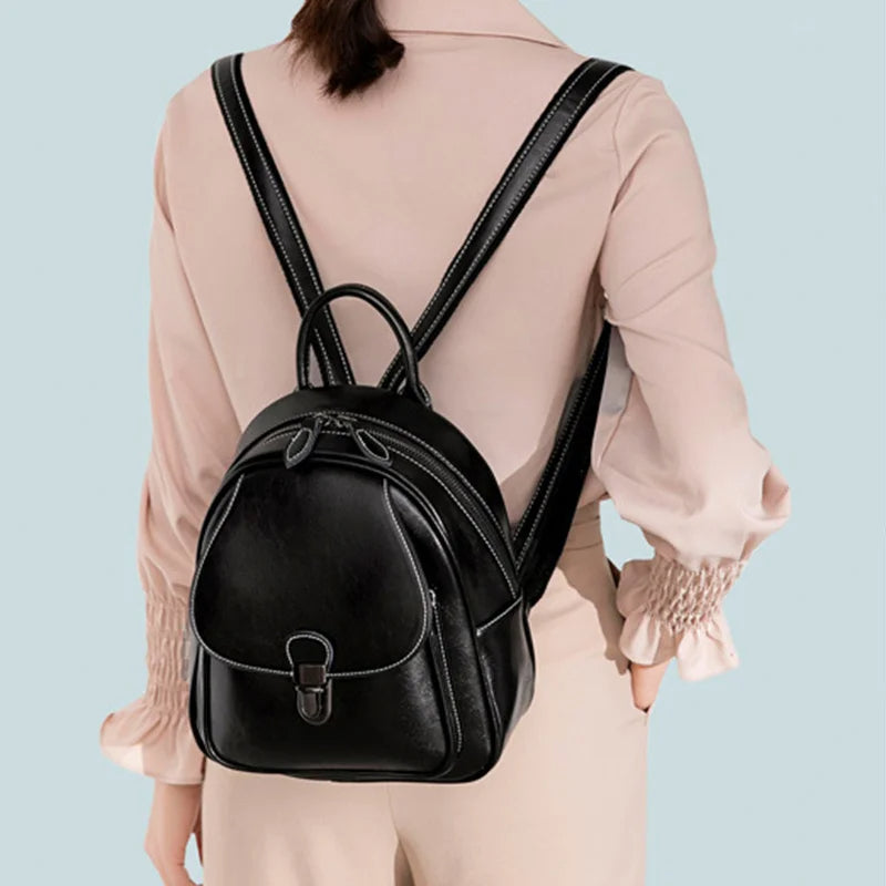 Chic kompakt ryggsäck med elegant charm