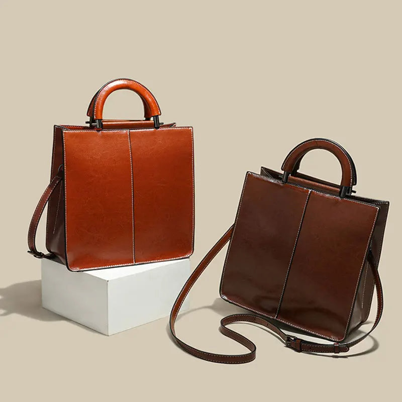 Strukturerad crossbody-väska med handtag