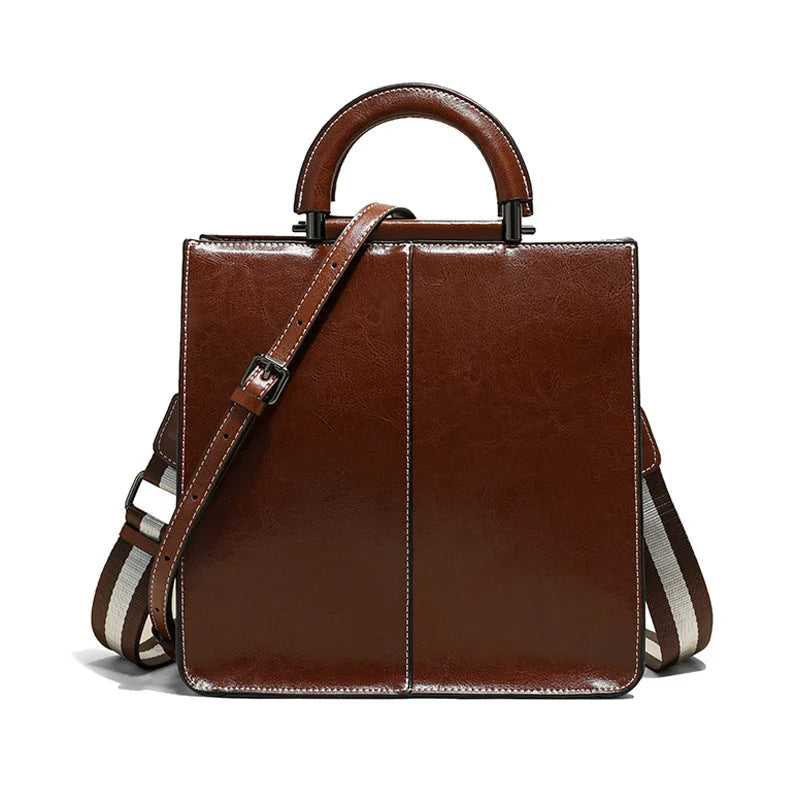 Strukturerad crossbody-väska med handtag