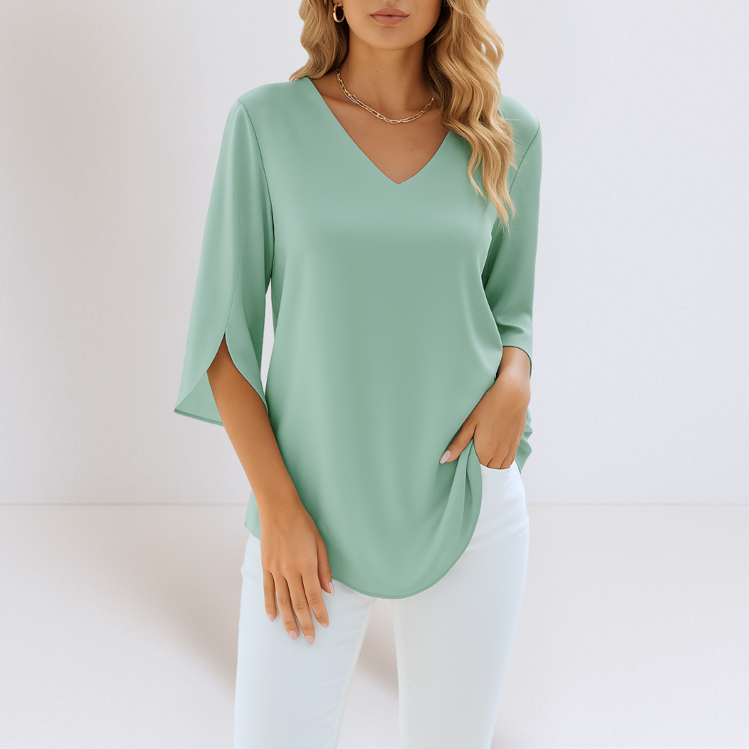 Sophie | Elegant blus med V-hals och spruckna ärmar
