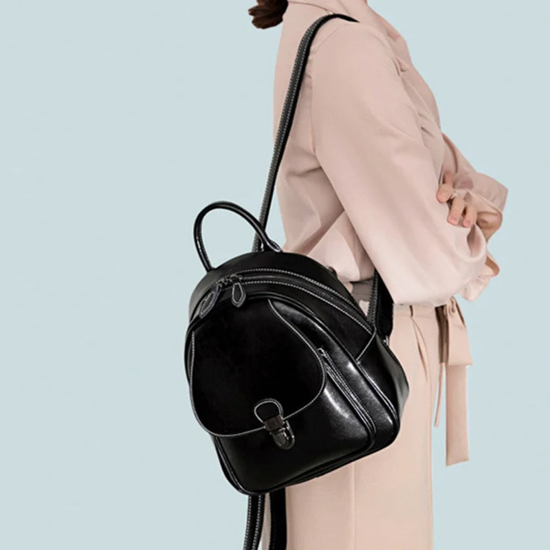 Chic kompakt ryggsäck med elegant charm