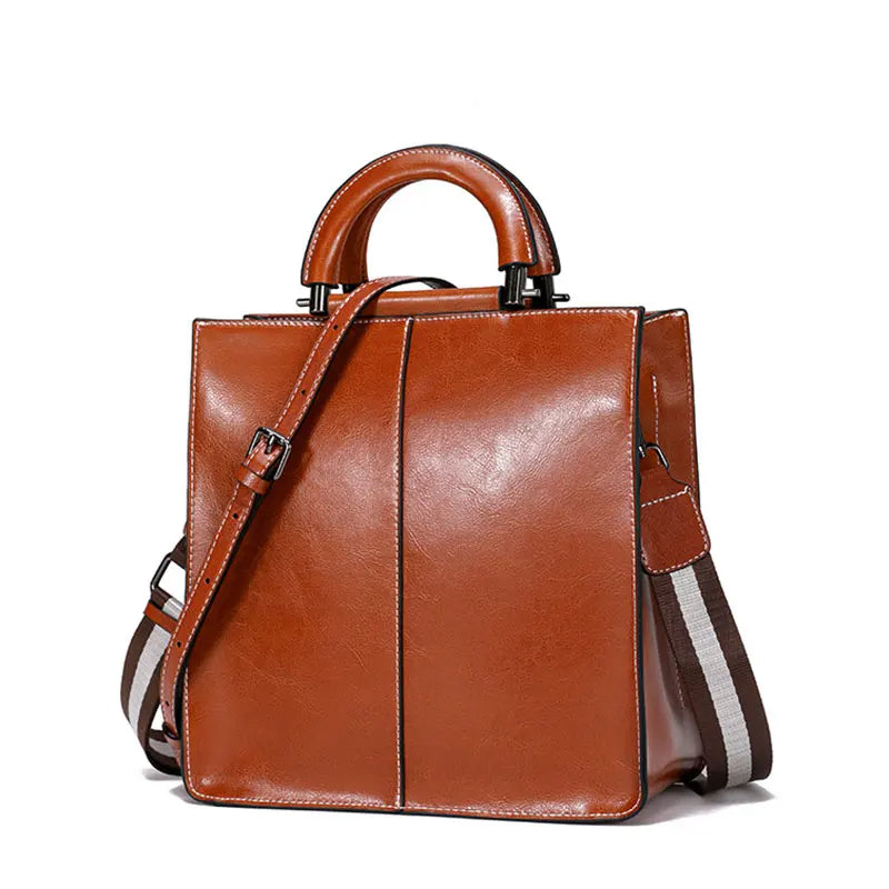 Strukturerad crossbody-väska med handtag