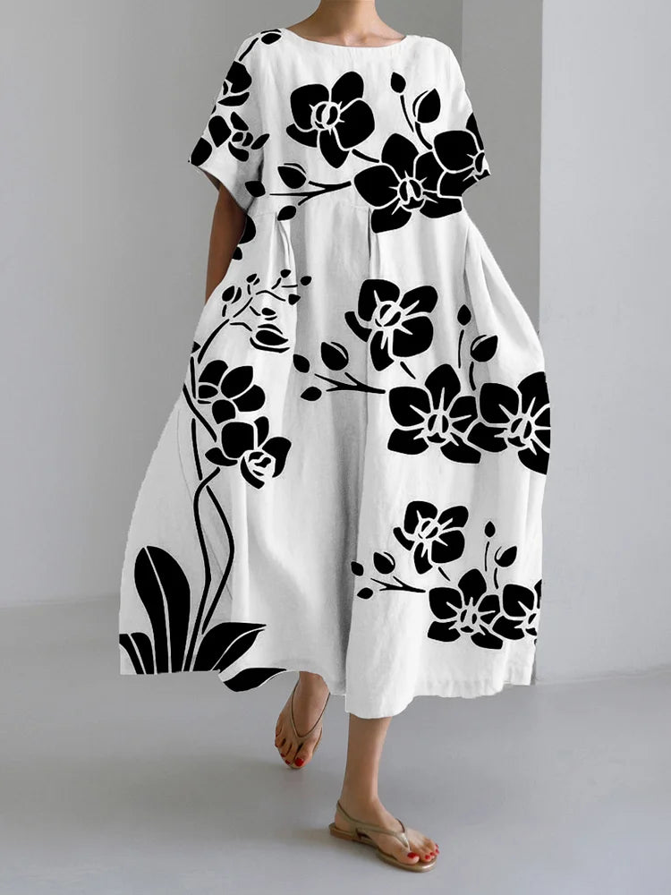 AVA - ELEGANT SVART BLOMMA KLÄNNING