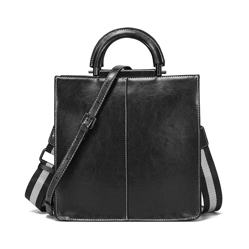 Strukturerad crossbody-väska med handtag