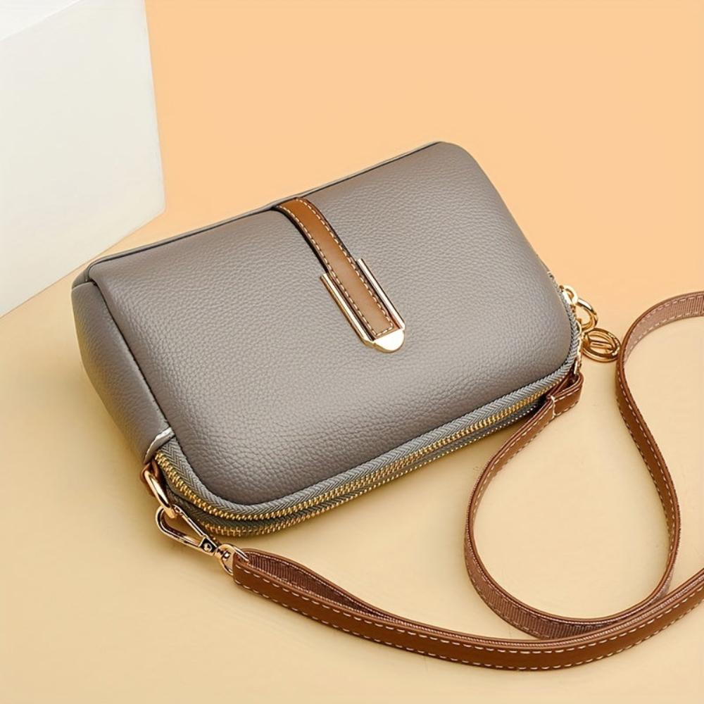 Mila Litchi Crossbody-väska med präglad design