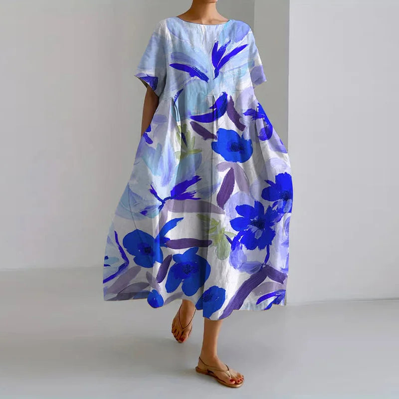 Poppy | Blommig Sommarklänning med Smickrande Snitt